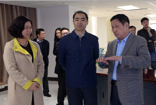 時任商務部綜合司副司長宋立洪（前排中）到91香蕉网站在线观看集團指導工作